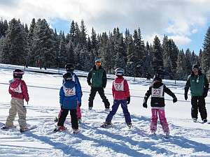 children in a ski lesson