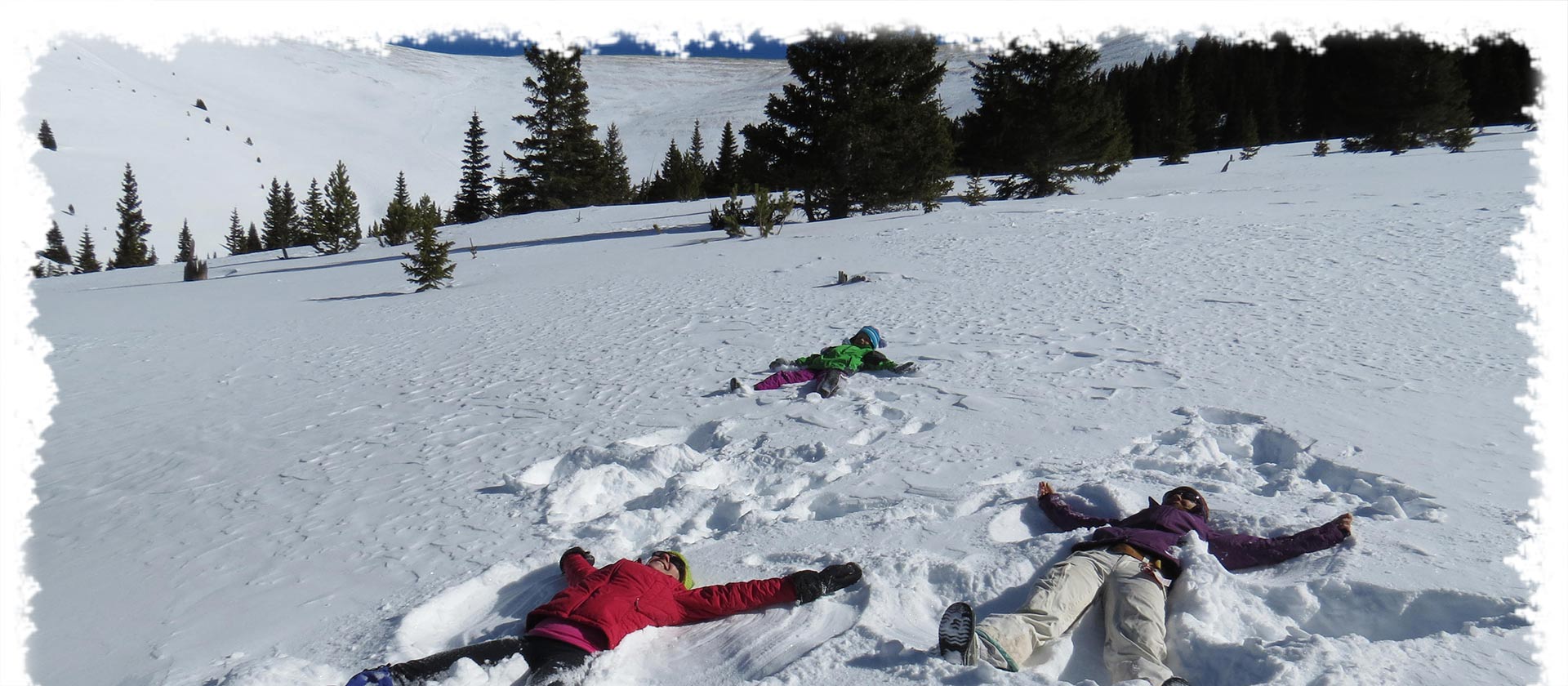 kids making snow angels on chicago ridge