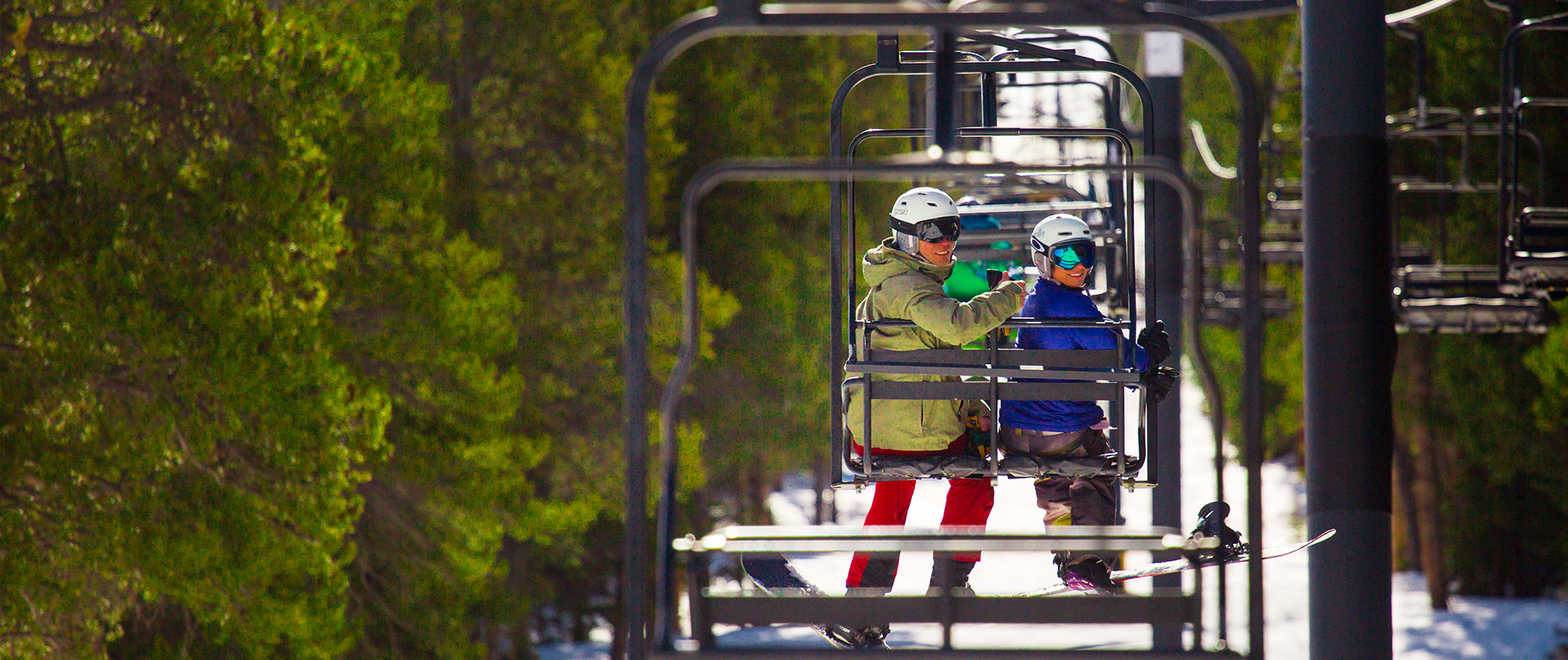 two people on a chairlift