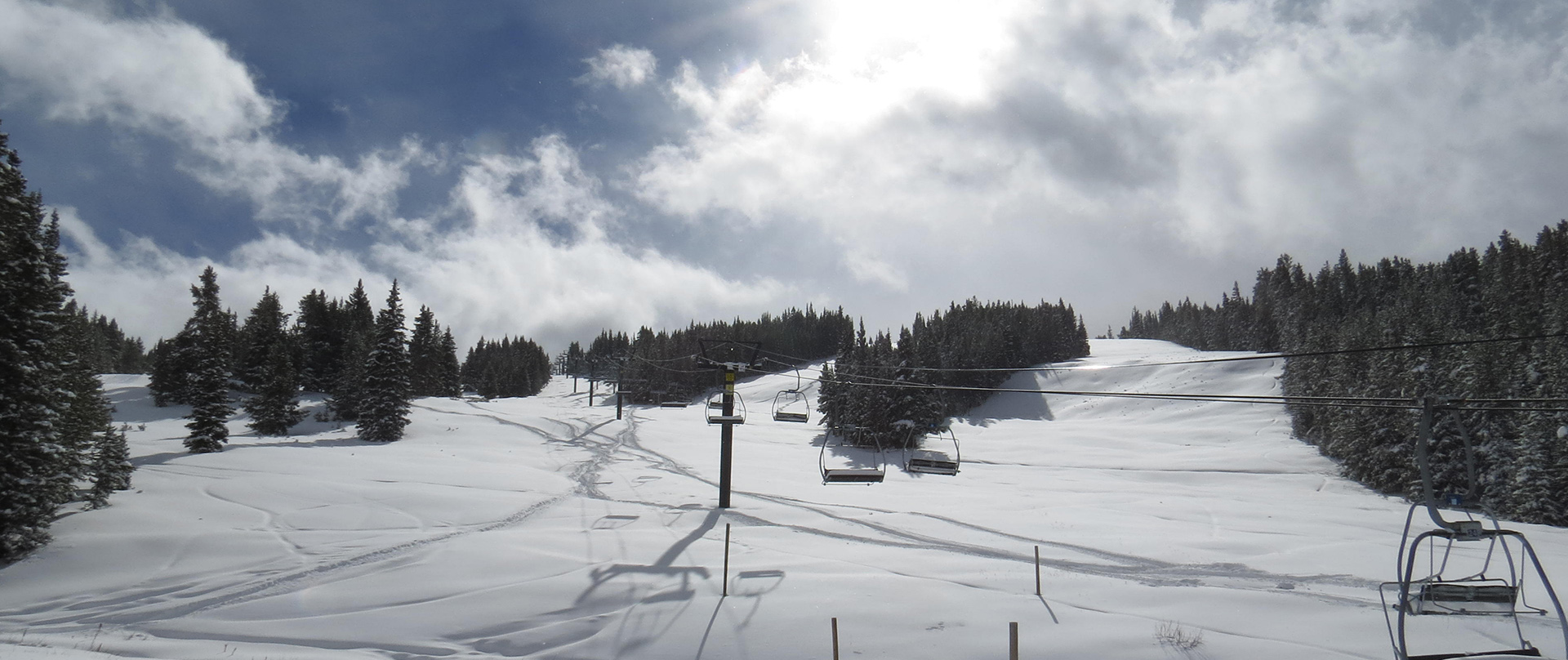 snowy runs near the triple chair