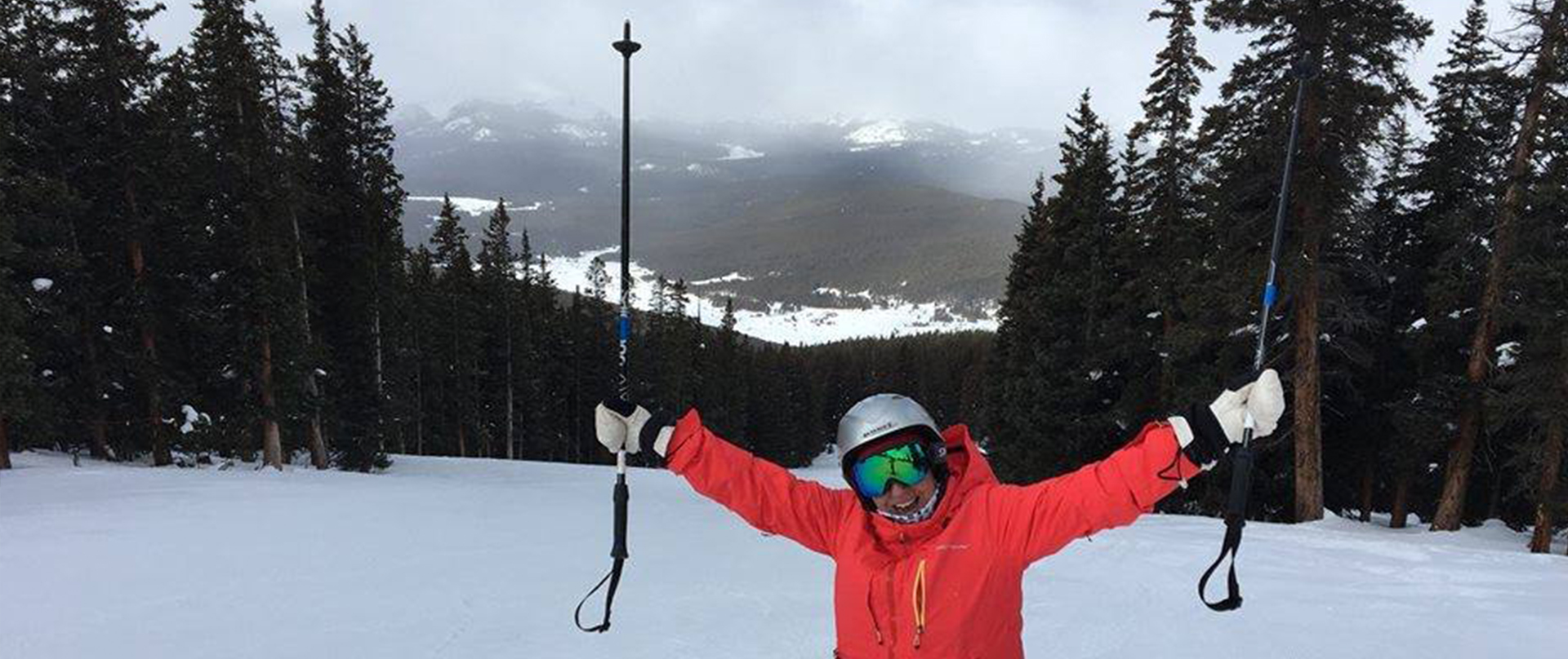 one person standing on the ski slope