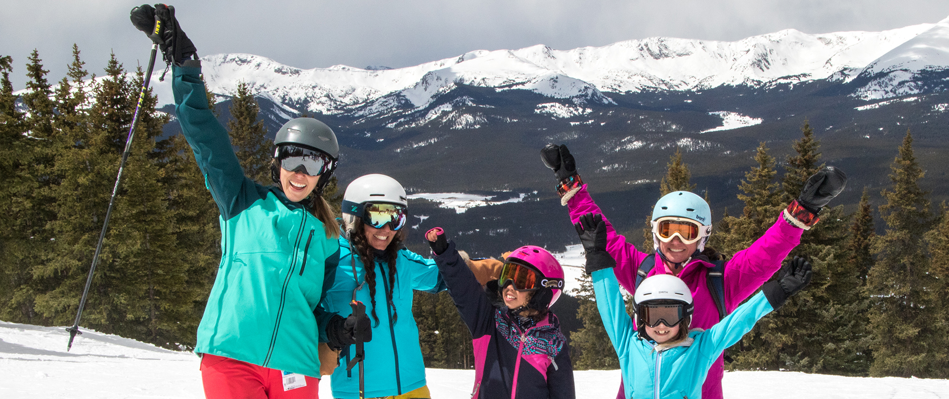 Ladies cheering at the top of the mountain