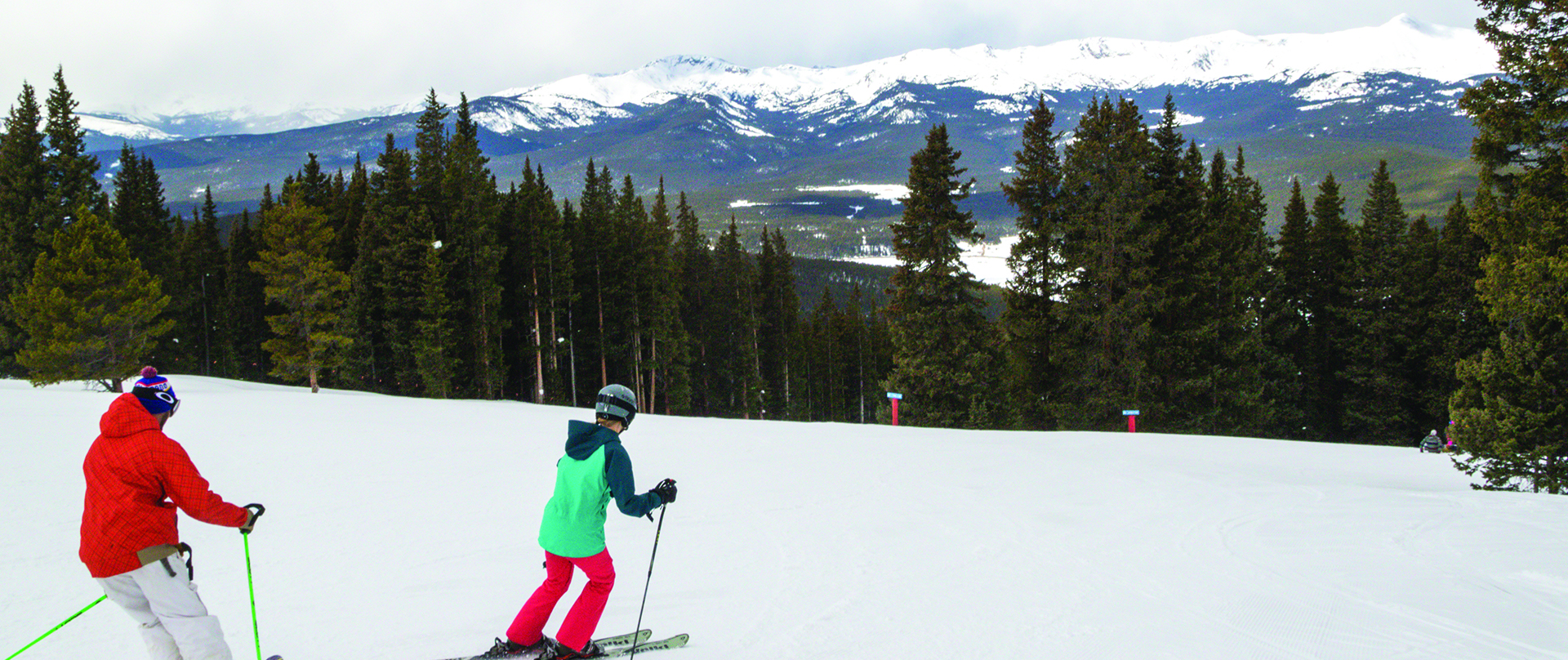 two people skiing