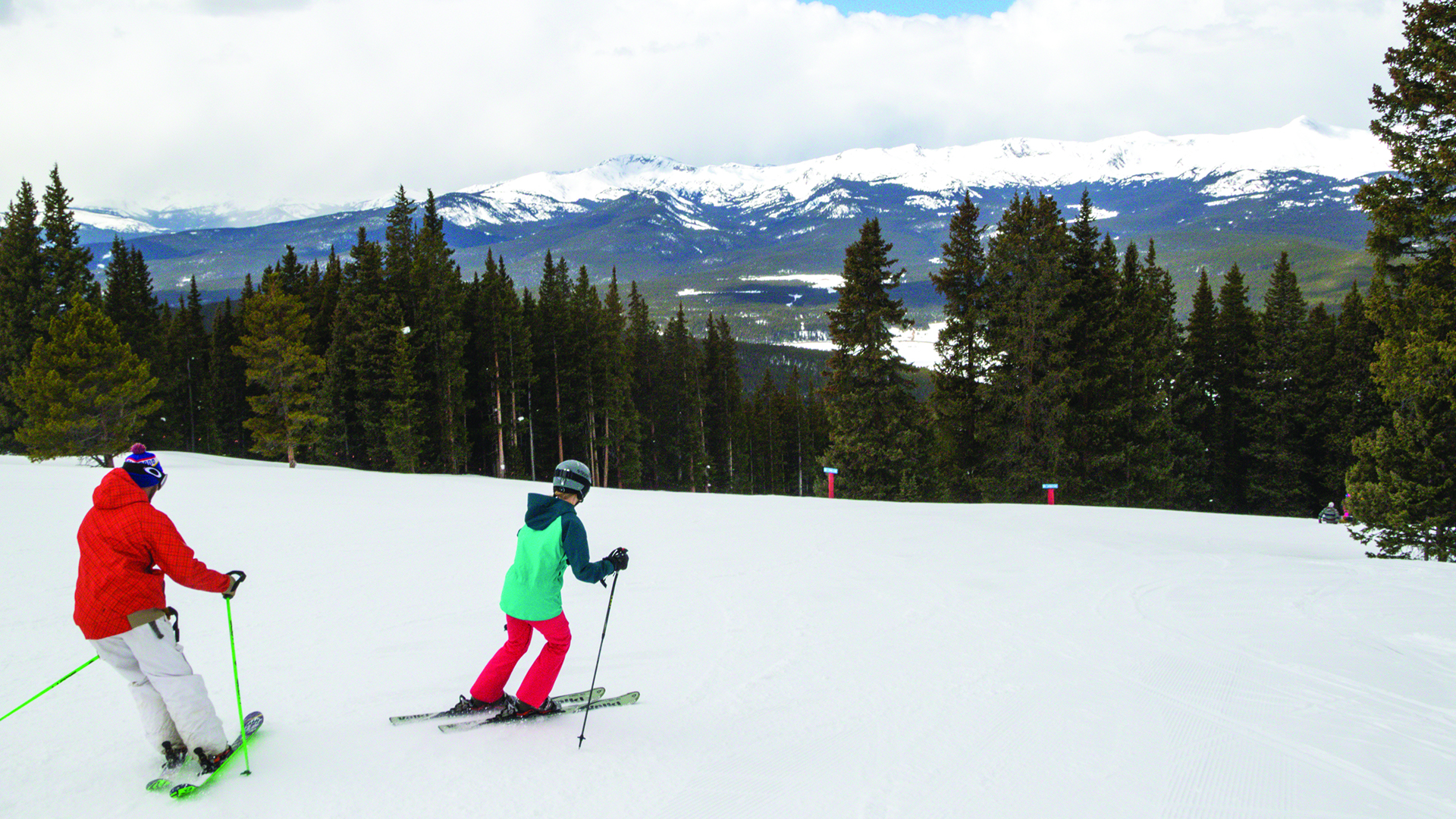 two people skiing