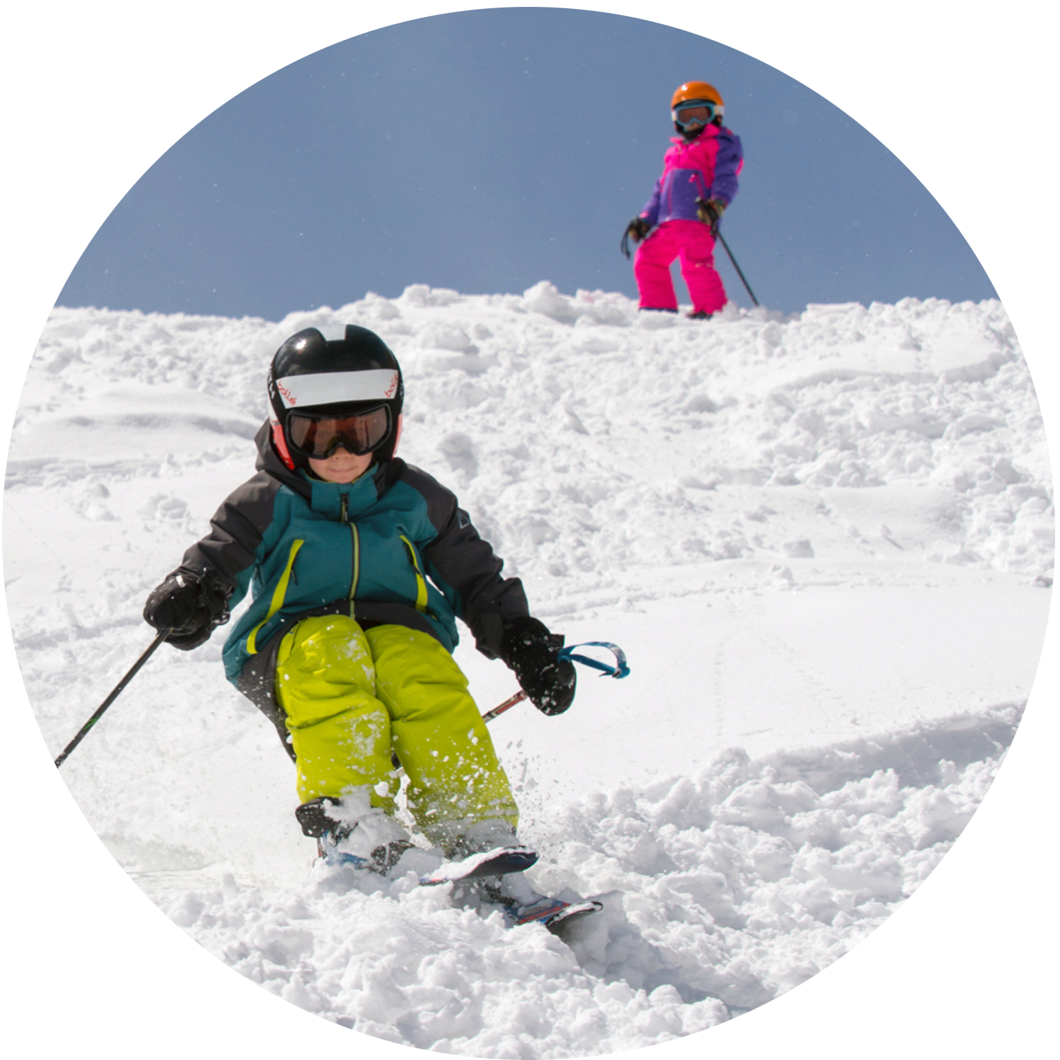 Two kids skiing
